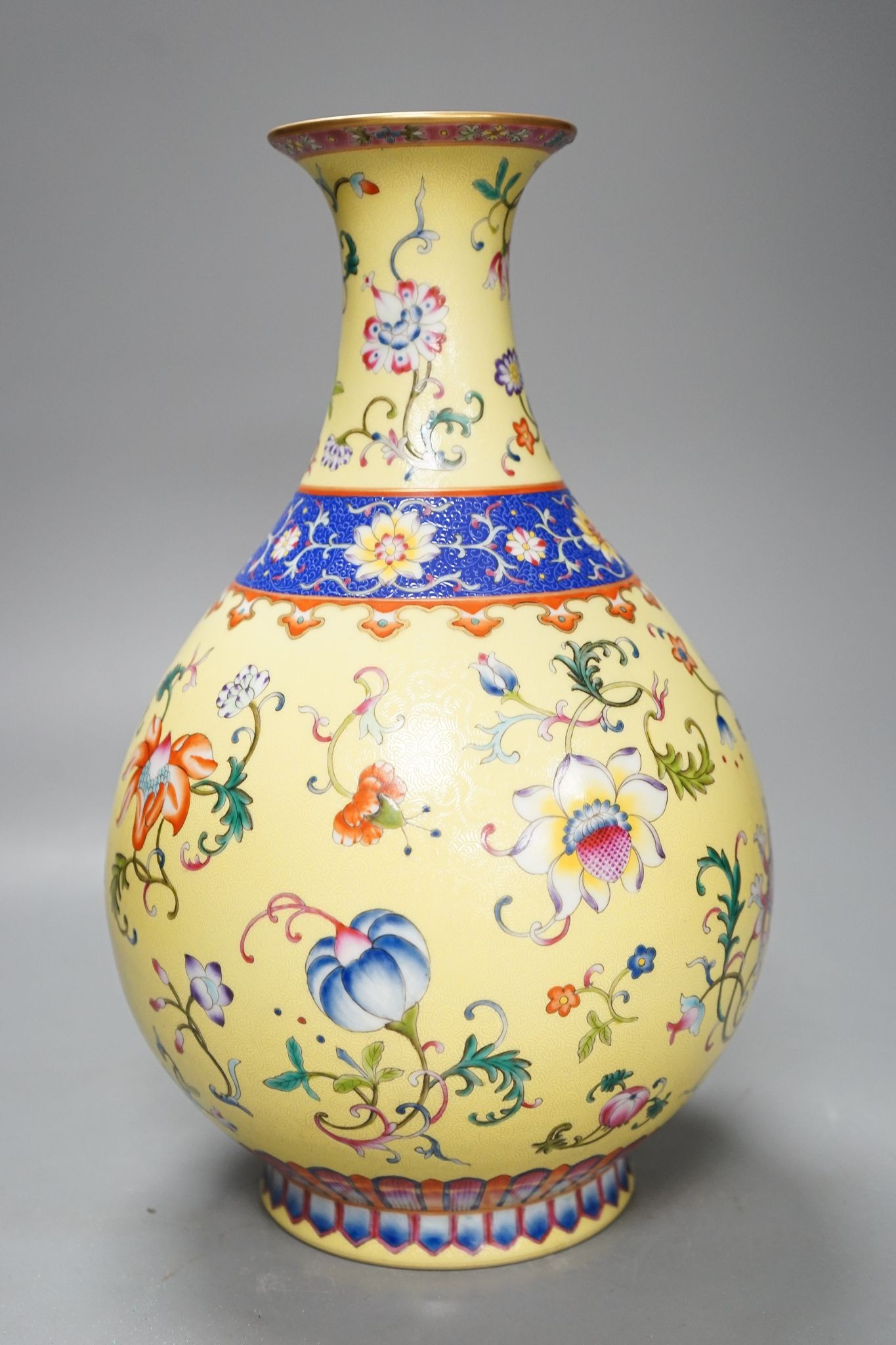 A Chinese yellow-ground porcelain pear-shaped vase, 34cm